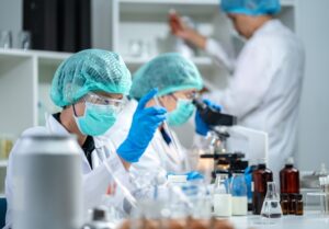 People at work in a biotech lab.