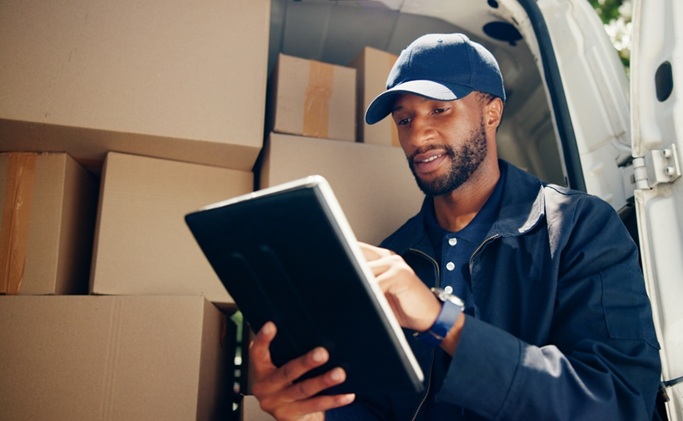 Courier Lab technicians examining specimens moved by RTD courier services in Peabody, MA